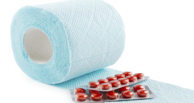 Laxative pills on tissue paper