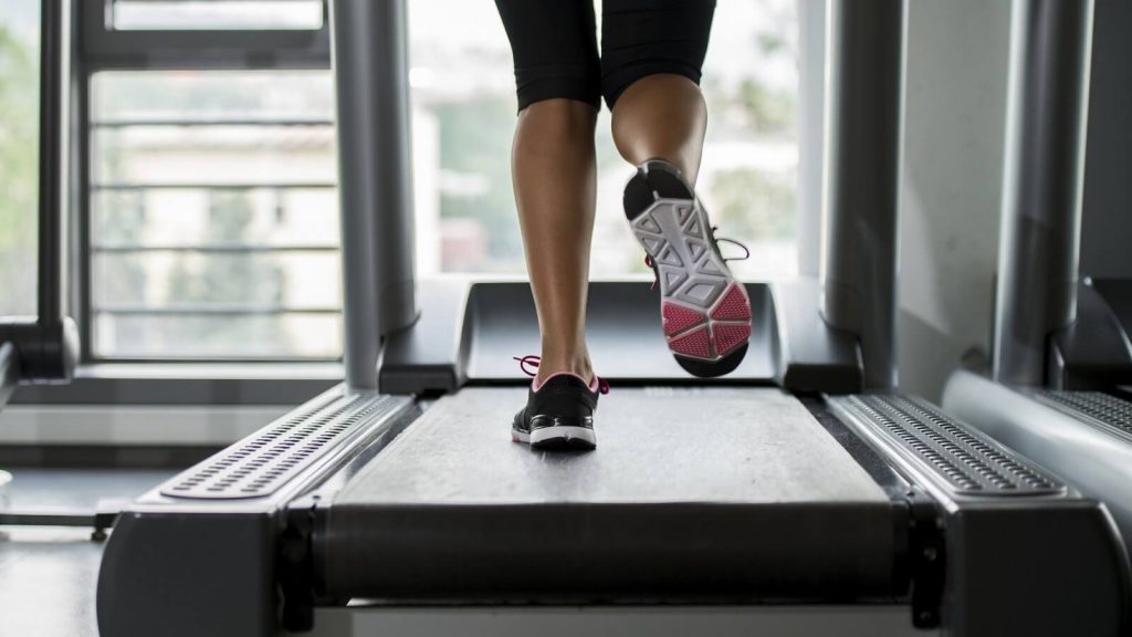 person running on treadmill