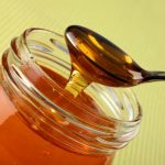 a-spoonful-of-honey-from-a-jar