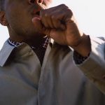 man_coughing