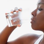 Black-Woman-drinking-water