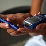 getty_rf_photo_of_person_checking_blood_sugar