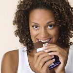 Black-woman-eating-dark-chocolate