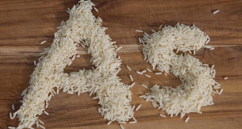 Rice grains spelling the short form of arsenic