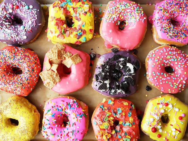 Donuts with extra toppings, a junk food
