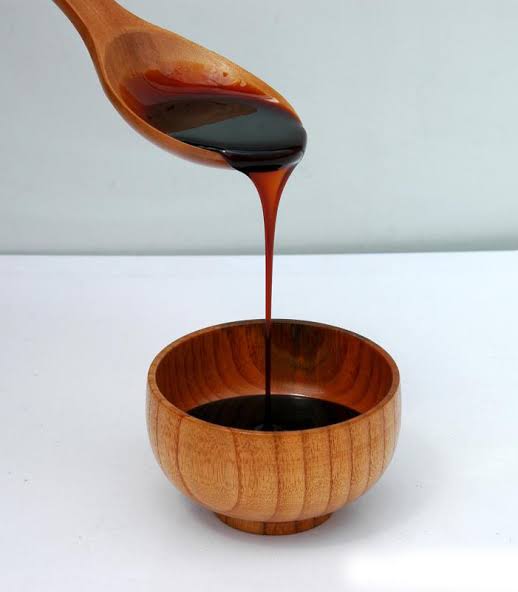 Molasses, not  present in refined sugar
