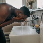 Young man doing morning rituals